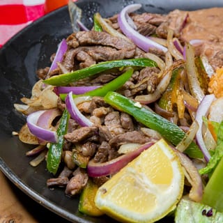Carne Encebollada
